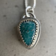 "This pendant features a sterling silver setting around a beautiful piece of White Water (Mexico) Turquoise. The sterling backplate has been hand textured. This is the exact piece you will receive. This piece will arrive on a sterling silver chain and the pendant itself measures approximately 3/4\"H. Growing up on the island of Martha's Vineyard I was surrounded by sandy beaches and crashing ocean waves. I draw inspiration from both of these things and often use sand or seaweed to texture my wor Artisan Silver Turquoise Necklace With Chrysocolla, Artisan Sterling Silver Turquoise Necklace, Artisan Untreated Turquoise Necklace, Untreated Turquoise Sterling Silver Necklace, Metalsmithing Jewelry, Cotton Pouch, Martha's Vineyard, Necklace Turquoise, Jewelry Sterling Silver