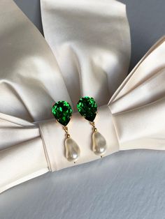 Elegant teardrop earrings featuring dark moss green tops paired with ivory crystal baroque dangles. Made with Premium Quality European Crystal. Available in gold, rose gold or silver finish. Post back.  - Measurements :    1 5/8" long from the top to the bottom of the earring    1/2" wide * RETURN POLICY - We do not accept returns for a refund as all of out items     are made to order. But please contact us if you are     having an issue with your order. - We do accept exchanges. You can exchang Green Pearl Drop Jewelry, Green Drop Pearl Earrings For Wedding, Green Elegant Pearl Drop Earrings, Green Teardrop Pearl Earrings For Wedding, Green Pearl Drop Earrings For Formal Occasions, Elegant Green Pearl Drop Earrings, Elegant Green Drop Pearl Earrings, Green Teardrop Jewelry With Pearl Drop, Green Teardrop Pearl Drop Jewelry