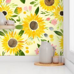 a kitchen with sunflowers painted on the wall