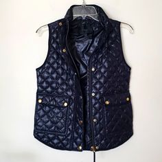 J. Crew Down Filled Quilted Puffer Vest, Navy Blue, Women's Size Xxs. Nwot. Perfect Condition. Approximate Measurements Taken Laying Flat Across. Pit To Pit. 16.5 Length. 24 Trendy Blue Vest Outerwear, Trendy Blue Sleeveless Outerwear, Trendy Blue Winter Vest, Navy Fitted Vest For Fall, Navy Fitted Winter Vest, Navy Fitted Vest For Winter, Quilted Puffer Vest, Walker Boots, Garment Bags