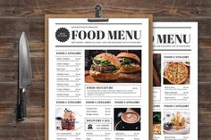 a restaurant menu is displayed on a clipboard next to a knife and fork, along with other food items