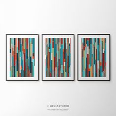 three framed art pieces on a wall with the words hellolostudio above them