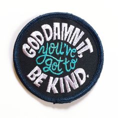 a badge that says, god damnly you're got to be kind