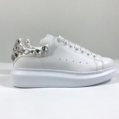 NWB Alexander McQueen Oversized Crystal Embellished Sneaker 38.5 EU 733014 Larry Stunning shoes for bridal events! NEW with box! Retail: $1150 - Authentic - Color: White / Crystal 9069 - Size: 38.5EU, Nordstrom size 8.5 US fits true to size - Crystal-embellished heel - Padded tongue and collar for optimum comfort - Round toe - Lace up - Logo at tongue - 1.75" platform - Calfskin leather upper and lining, rubber sole - Made in Italy - Brand style ID: 733014WICYH - MPN: 733014 WICYH 9069 Shoes For Bridal, Bridal Events, Alexander Mcqueen Shoes, Stunning Shoes, Bridal Event, Brand Style, White Crystal, Alexander Mcqueen, Calf Skin