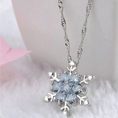 Boutique Item Color Silver Design Is Snowflake With Blue Center Stones. Chain Length Is 18” Extends To 20” Very Beautiful Good Quality Gorgeous 2 Cute Elegant Silver Necklace For Winter, Silver Clavicle Necklace For Christmas, Sterling Silver Necklace For Winter, Blue Snowflake Sterling Silver Necklace, Winter Sterling Silver Necklace, Silver Clavicle Chain Necklace For Christmas, Silver Pendant Necklace For Winter, Elegant Silver Necklace, قلادات متدلية