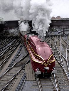 LMS Coronation Class locomotives, introduced in 1937 to commemorate the coronation of King George VI. These streamlined trains were designed by W. A. Stanier. Steampunk Aesthetic, Flying Scotsman, Steam Engine Trains, Steam Railway, Kings Cross, Train Art, Old Trains, Cable Cars, Train Pictures