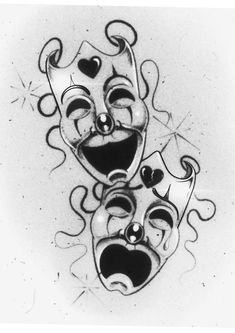 two masks with faces drawn in black and white, one has a heart on it