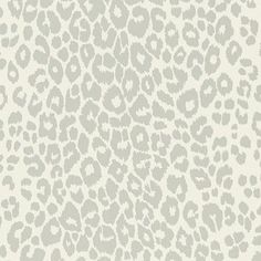 an animal print wallpaper in grey and white