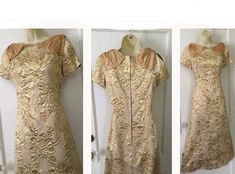 For sale is this gorgeous gold colored floral brocade short sleeve with bow embellished shoulders 1960's vintage shift midi dress from SMARTWEAR - Irving Saks department store of Roanoke, Virginia. The dress is fully lined and has a boat neckline. It is from the 1960's, bows at the shoulders, with short sleeves that have a cutout detail at the top of it. The dress' shell or top fabric is made of a floral silk brocade in a gold color. There are bust darts, metal back zipper. Slimming princess sea Vintage Brocade Fitted Dress, Vintage Fitted Gold Dress, Fitted Vintage Brocade Dress, Fitted Vintage Gold Dress, Gold Fitted Vintage Dress, Fitted Gold Retro Dress, Gold Fitted Retro Dress, Vintage Midi Dress, Roanoke Virginia