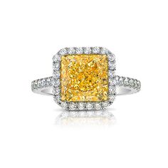 yellow diamond ring. yellow diamond. fancy yellow diamond. yellow diamond engagement ring. yellow diamond halo ring. canary diamond ring. yellow diamond jewelry. GIA certified yellow diamond. Elegant Yellow Emerald Cut Diamond Ring, Elegant Yellow Emerald-cut Diamond Ring, Luxury Gia Certified Diamond White Sapphire Ring, Yellow Diamond Ring For Anniversary, Dazzling Brilliant Cut Yellow Diamond Ring, Dazzling Yellow Brilliant Cut Diamond Ring, Dazzling Yellow Diamond Ring With Accents, Luxury Gia Certified Cluster Ring In Yellow Gold, Luxury Gia Certified Yellow Gold Cluster Ring