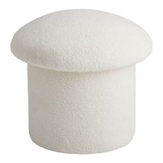 a white stool with a round shaped top