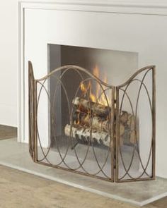 a fireplace with a fire burning in it