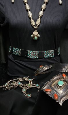 Vintage Navajo turquoise cowgirl belt-35" black leather with conchos-Western style Navajo Old Pawn jewelry. Old Pawn Navajo Turquoise Cluster Concho Belt. This belt comes from a distinguished Old Pawn collection, dating back to the 1940s-1950s. The absence of a maker's mark is typical for pieces of this vintage. The rectangular Conchos feature traditional Sterling silver backs with oxidized black plates, complemented by delicately polished handmade Sterling silver balls. The belt is currently on a new black leather strap, sized small. However, the Conchos can be easily transferred to a larger leather belt for personalized fitting. The turquoise stones are securely set throughout the belt, with only two cracked stones in the buckle that remain firmly in place. This belt, cherished over time Vintage Black Jewelry For Western-themed Events, Black Concho Jewelry For Western-themed Events, Vintage Adjustable Turquoise Belt, Adjustable Vintage Turquoise Belt, Adjustable Turquoise Vintage Belt, Artisan Concho Jewelry, Black Southwestern Concho Jewelry, Southwestern Black Concho Jewelry, Southwestern Concho Jewelry