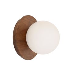 a wooden door knob with a white ball on the front and back of it, against a white background