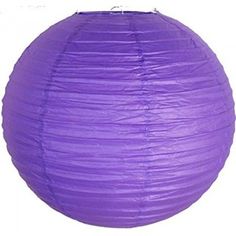 a round purple paper lantern on a white background