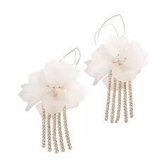 Penelope Flower and Rhinestone Tassel Earrings are flirty feminine flower earrings featuring statement-making rhinestone strands that sparkle and shine. Perfect for when you want to add that final touch that will catch the spotlight, these glamorous earrings are perfect for when you want to stand out in a crowd! About 5 inches long Special occasion item = FINAL SALE Penelope Flower, Rhinestone Tassel Earrings, Coral Rose, Face Gems, Ear Jacket Earring, Sparkle And Shine, Final Touch, Earring Sale, Chain Ring