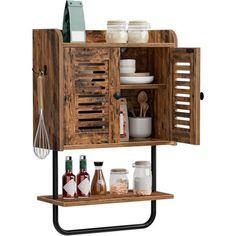 a wooden cabinet with shelves and utensils on it