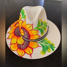 New Without Tags. From Cancun Mexico 100 % Natural Fiber Hand Painted Floral Design By Artisan Communities. Smoke / Pet Free Home *** Please Look Closely At All Pics For More Details Wide Brim Beach Hat For Cinco De Mayo, Wide Brim Hats For Beach And Cinco De Mayo, Yellow Wide Brim Straw Hat In Toquilla Straw, Yellow Wide Brim Toquilla Straw Hat, Brimmed Beach Hats For Cinco De Mayo, Adjustable Straw Hat For Beach And Cinco De Mayo, Yellow Bohemian Fedora Straw Hat, Multicolor Hats For Vacation And Cinco De Mayo, Yellow Bohemian Straw Hat With Short Brim