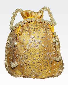 "Mustard Yellow Texture Hand Crafted Potli Bag With Beaded Chain For Women|| Evening Bags, Embroidery Handbag. Designed with the heart with zardozi , pearls work on this mustard yellow colour by using a premium quality of silk fabric. This beautiful Potli or evening party bag are eye catchy and made of premium material. Key Features: **Fabric: Silk **Size: 10\" x 8\" Colour: Mustard Yellow ** Easy to carry, The handle of the purse is beaded with pearl. **Easy to lock and unlock with matching drawstring. Tassels beaded with pearls **Beautiful embroidery detail work crafted with pearls, Zardozi, embroidery at the front side. **This potli purse is good match with your outfits and are superb for wedding and festive parties. **This would be best complement to your designer of any other kind of Traditional Beaded Rectangular Pouch, Traditional Beaded Clutch Bag, Traditional Gold Clutch With Pearl Embroidery, Bohemian Beaded Potli Bag For Wedding, Beaded Rectangular Potli Bag For Festive Occasions, Traditional Beaded Pouch Clutch, Gold Embroidered Pouch As Gift, Festive Beaded Rectangular Potli Bag, Gold Embroidered Clutch For Festivals