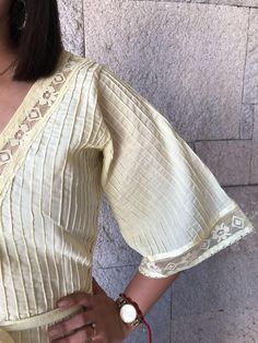 "Very rare Mexican dress, definitely a unique piece. zipper up. Made in 1970's Light Yellow pintuck cotton, you can see through it. Gorgeous details with lace. Fits size Small Measurements taken flat: Armpit to Armpit 18 1/4\" Waist 15\" HIps 19\" Bottom hem width 33 1/2\" Shoulders to bottome hem 50 1/2\"" Fitted Bohemian Kaftan With Kimono Sleeves, Summer Festival Kurta With V-neck, V-neck Kurta For Summer Festivals, Summer Wedding Dress With Kimono Sleeves, Bohemian Fitted Dresses With Yoke Detail, Bohemian Maxi Dress With Bell Sleeves, Fitted Bohemian Kaftan For Wedding, Fitted Bohemian Wedding Kaftan, Summer Anarkali Maxi Kaftan