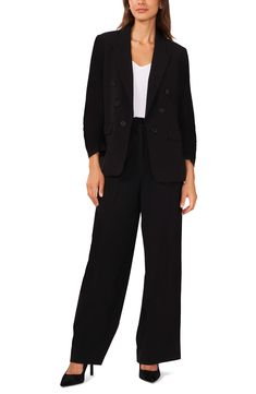 This polished blazer is designed in a double-breasted silhouette with peaked lapels and six-button cuffs. 27" length (size Medium) Peaked lapels Six-button cuffs Lined 63% polyester, 33% rayon, 4% spandex Dry clean Imported Semi-formal Notch Lapel Pantsuit With Button Closure, Business Casual Long Sleeve Double-breasted Pantsuit, Chic Black Double-breasted Suit, Black Double-breasted Suit For Work, Tailored Black Double-breasted Blazer, Chic Black Tailored Double Breasted Suit, Double-breasted Tuxedo Style Pantsuit For Workwear, Black Double-breasted Blazer For Office, Tuxedo-style Structured Blazer With Double Buttons