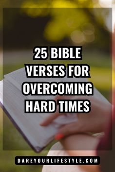 a person holding a book with the words 25 bible verses for overcoming hard times