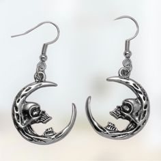 Get These Trendy Goth Unisex Moon & Skull Face Silver Tone Dangle Earrings Today Brand New Antique Silver Tone Zinc Alloy Fashion Jewelry Ear Drop Height 2in Goth Biker Hip Hop Rock Star Rocker Band Concert Check Out My Closet For Other Fun Jewelry . Bundle & Save Emo Gift Ideas, Moon Skull, Earrings Gothic, Goth Earrings, Crescent Earrings, Crescent Moon Earrings, Holiday Earring, Skull Earrings, Sterling Silver Cross