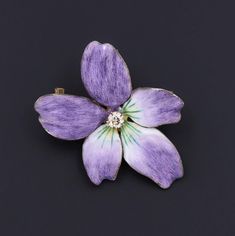 During Victorian and Edwardian times the gift of violets suggested that the giver's thoughts were occupied with love. A perfect love token, this 14k gold and purple enamel brooch/pendant features a glistening diamond accent at its center. The piece measures 1.4 inches from top to bottom by 1 inch wide, and it is in excellent condition. We have many other fantastic offerings of period fine jewelry posted on our Etsy store, so please consider browsing our other items. We send all items in individu Small Edwardian Purple Brooch, Hallmarked Enamel Brooches As Gifts, Hallmarked Enamel Brooches For Gifts, Gift Enamel Brooches Hallmarked, Yellow Gold Enamel Brooches For Gifts, Antique Purple Brooches As Gift, Lavender Brooch Jewelry As A Gift, Purple Brooch Jewelry Gift, Jewelry Post