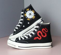 Embroidery converse/ Custom embroidered snake sneakers/ Converse high tops embroidered snake/ converse kid/ shoes kid/ gift for daughter  💸 Price includes Converse Shoes and floral embroidery as shown 🌸 You can send me your Converse/Vans shoes or I can buy them for you. We stock all the Converse and Vans shoes you want, if you want other Converse/Vans shoes in the store, please message us. Your embroidered Converse/Vans shoes will be available for shipping in 7-15 days. 🌸 I started hand embroidering on fashionable clothes and handbags over 20 years ago - and now on CONVERSE/VANS shoes, an American icon, a must-see classic! I'm excited to give your Chuck Taylor shoes a new look with beautiful, nature-inspired embroidery. All images, designs and text used by CUSTOMSHOEDESIGNSOHO are copyr Black Custom Converse Sneakers, Embroidered Low-top Sneakers For Streetwear, Halloween Converse, Embroidered Lace-up Sneakers For Streetwear, Black Mid-top Converse Custom Sneakers, Black Converse Embroidery, Custom Converse Embroidery Text, Embroidered Black Lace-up Sneakers, Black Embroidered Lace-up Sneakers