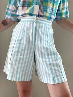 "Stripes & more. Darling High Waist Striped Bermudas in Size 5/6. Fits S/M best. Please refer to measurements below. Feels like Cotton. Front button and zipper for closure. Cute little side slits at front. Light blue/teal stripes. Good preloved condition. Shows normal signs of wear.  The colors of the photographs may differ slightly from the actual item colors. Measurements were taken with item laying flat, and are approximate. Waist: 13.5\" Rise: 14\" Inseam: 8\" Length: 19\" Hips: 21\" Please Spring High-waisted Striped Shorts, Relaxed Fit Striped High-waisted Shorts, Casual High-waisted Vertical Stripe Shorts, Relaxed Fit Striped Bottoms With Built-in Shorts, Striped High-rise Cotton Shorts, Green Heels, Statement Shoe, Blue Teal, Lace Blouse