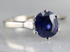 an oval shaped blue sapphire ring set in white gold