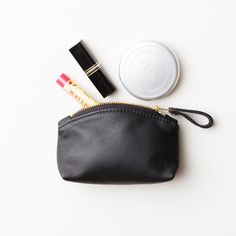 "This mini clutch is a great little cosmetics pouch to organize your essentials in a larger bag. It's also a perfect bridesmaid gift or any special someone. It's individually handcrafted with your choice of SIX butter soft cowhide leather colors (black, navy, dark brown, red, burgundy or light tan). Would you like to add a monogram, name or word to this mini clutch? If so, please take a look at the listing below. You can add foil embossed letters to this clutch. https://etsy.me/2V9cw4m * Do you University Essentials, Cosmetics Pouch, Mini Makeup Bag, Sixth Form, Leather Makeup Bag, College Essentials, Leather Colors, Purse Organizer, Small Cosmetic Bags