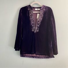 Chico's Nwt Purple Romance Kachina Velvet Tunic. Lush Deep Purple Velvet, Tunic, With A Split Hem For Comfort, Beautiful Embellished Neckline, Long Sleeves And A Hook And Eye Closure At The Neckline To Wear It Different If You Want. It Is Beautiful. Size 1 (Chico's Sizing 1 M/8 Bust 36½"-37½" Waist 31"-32" Hips 39½"-40½") It Is In Nwt Condition. Ap To Ap Approx. 21" Please Ask Questions I Will Be Happy To Help. All Nwt Items Must Be Returned In Original Condition With Tags Attached. Purple Tunic, Striped Tops Women, Velvet Tunic, Beige Blouse, Womens Lace Tops, Velvet Kimono, Long Tunic Tops, Linen Cardigan, Embellished Neckline