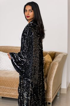 Luxuriate in this velvet sequins wrap dress with wide sleeves. Savor the elegance of this hand-finished kimono robe that looks like a piece of art. Buy now! Elegant Sequin Dress For Glamorous Events, Chic Wrap Kimono For Parties, Elegant Evening Kimono For Festive Occasions, Elegant Festive Kimono For Party, Elegant Long Sleeve Kimono For Night Out, Elegant Long Sleeve Kimono For Parties, Luxury Long Sleeve Evening Kimono, Dress With Wide Sleeves, Sequin Wrap Dress