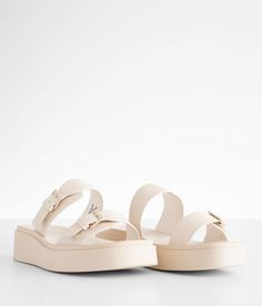 Soda Deals Double Buckle Platform Sandal - Cream US 6, Women's Ivory Faux leather strappy sandal Adjustable buckles Lightly cushioned footbed 2 heel. All man made materials.. WOMEN'S SHOE SIZE CONVERSION CHART US 5 6 7 8 9 10 11 12 EU 35-36 36-37 37-38 38-39 39-40 40-41 41-42 42-43 UK 3 4 5 6 7 8 9 10 *Conversion sizes may vary. Available in whole sizes. Half sizes need to go up to the next whole size. Apparel & Accessories > Shoes Beige Double Strap Sandals With Buckle Closure, Cream Open Toe Sandals With Buckle Closure, Cream Buckle Closure Sandals For Beach, Beige Sandals With Buckle Closure And Single Toe Strap, Adjustable Strap Open Toe Jelly Sandals, Synthetic Open Toe Jelly Sandals With Buckle Closure, Beige Open Toe Footbed Sandals With Adjustable Strap, Beige Adjustable Strap Open Toe Footbed Sandals, Beige Double Strap Sandals With Textured Footbed