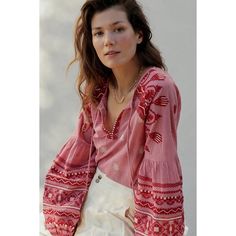 Sophisticated And Sweet, This Peasant Blouse Is A Charming Staple For The Season. Cotton Embroidered Detail Spliced Neck With Tie Pullover Styling Hand Wash Imported Dimensions Standard: 25"L Petite: 23.25"L Plus: 28"L Red Bohemian Embroidered V-neck Top, Chic Pink Blouse With Floral Embroidery, Red Tops With Embroidered Sleeves For Spring, Bohemian Red Embroidered V-neck Top, Red Bohemian V-neck Embroidered Top, Red Blouse With Embroidered Sleeves, Red Blouse With Geometric Embroidery, Feminine Floral Embroidery Peasant Top, Red Embroidered V-neck Top For Spring