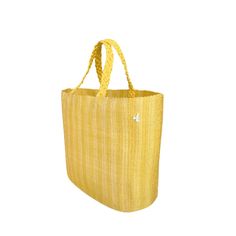 a yellow shopping bag with braid handles on the handle and bottom, against a white background