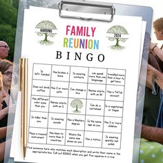 a family reunion game is being played on a clipboard in front of a group of people