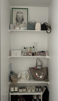 a white shelf filled with lots of personal items