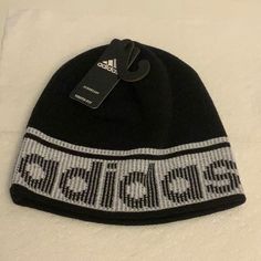 New Adidas Hat. Color Black/White. Adjustable White Adidas Hat, White Beanie Hats For Streetwear, White Outdoor Beanie Cap, Sporty Adjustable Winter Hats, Sporty Winter Hats With Adjustable Fit, Black Beanie For Sports, Black Sporty Beanie Hat, Sporty Black Beanie Hat, Adidas Casual Black Hat