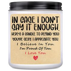 a candle with an i love you message on the front and back of it in a glass jar