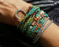 Multicolor Multi-strand Wrap Bracelet With Colorful Beads, Turquoise Multi-strand Wrap Bracelet As Gift, Turquoise Multi-strand Hand Wrapped Bracelet, Turquoise Multi-strand Wrap Bracelet, Southwestern Turquoise Hand-strung Beaded Bracelet, Brown And Green