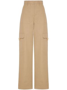 Beige cargo pants from Valentino Garavani in stretch canvas, wide leg, two side pockets, two cargo pockets with gold V detail, unlined. Beige Cargo Pants, Valentino Pants, Cargo Trousers, High Waisted Trousers, Tailored Trousers, High Waisted Pants, Harrods, Valentino Garavani, Bottoms Pants