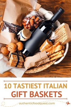 a basket filled with bread, crackers and wine bottles on top of a wooden table