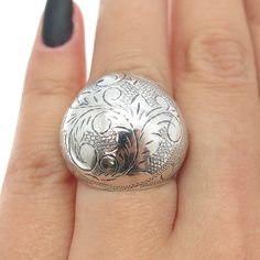 Great vintage condition.  925 Sterling Silver Vintage Siam Engraved Floral Dome Ring Size 6  Weight: 8.6g   WELCOME TO PAWN SHOP We are an actual pawn shop and have been in business for over 25 years. Since 1990, our establishment has been serving a variety of clients by providing them with short term cash solutions and options of liquidity regarding their treasured heirlooms. Acknowledging that today′s customers are very sophisticated and are looking for a variety of investments, our acquisitio Engraved Sterling Silver Dome Ring In White Gold, Engraved White Gold Dome Ring In Sterling Silver, Engraved White Gold Sterling Silver Dome Ring, Vintage Engraved Dome Ring For Formal Occasions, Oval Sterling Silver Engraved Ring, Silver Oval Etched Signet Ring, Classic Sterling Silver Carved Engraved Ring, Classic Carved Sterling Silver Engraved Ring, Classic Silver Carved Engraved Ring