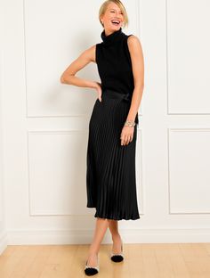 Gorgeous pleats make a statement on our have-to-have midi skirt. This streamlined silhouette is crafted from silky smooth satin with a flattering tie waist. Drapes beautifully. Instant elegance. Features Full Hits Below Knee Side zip closure Imported Fit: Misses: 31"; Petite: 28"; Plus: 31"; Plus Petite: 28 " Material: Machine Wash Cold, Gentle Cycle, Only Non-Chlorine Bleach When Needed; Tumble Dry Low, Cool Iron If Needed Care: 97% Polyester, 3% Spandex | Pleated Satin Midi Skirt Talbots Plated Skirt, Black Pleated Midi Skirt, White Cashmere Sweater, Satin Midi Skirt, Classic Style Women, Black Plates, Fashion Event, Pleated Midi Skirt, Cashmere Sweater