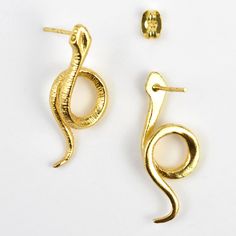 Handmade in Turkey Gold plated over brass Earrings measure about 1.25" long Post earring Click HERE to see more jewelry from AJS Design Goldmakers Jewelry Mission Statement Goldmakers Jewelry creates and curates a comprehensive selection of artfully designed hand-crafted jewelry. We aspire to offer the jewelry enthusiast access to affordable classics as well as fresh innovative designs. Handmade Gold Snake-shaped Earrings, Symbolic Metal Jewelry With Matching Earrings, Unique Adjustable Gold Clip-on Earrings, Symbolic Snake-shaped Brass Jewelry, Artistic Gold Brass Earrings, Artistic Gold Hoop Earrings As Gift, Artistic Gold Hoop Earrings For Gift, Artistic Brass Earrings Nickel Free, Bronze Snake Shape Jewelry As Gift