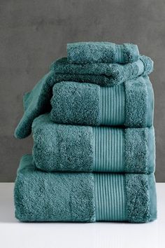 several folded towels stacked on top of each other