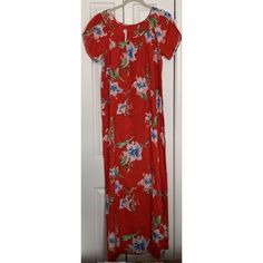 Hilo Hattie Women's Hawaiian Print Muumuu Dress. Red Floral Pattern. Kimono Sleeves. On-Seam Right Hip Pocket. Full Length Maxi Length. Ruffled Bottom Hem And Collar. Pull-On. New With Tags 100% Cotton Made In Usa Hawaii Size: Large Measurements: Across Armpits- 21.5" Across Hem- 37" Shoulder To Hem- 58" Floral Print Short Sleeve Maxi Dress For Holiday, Short Sleeve Maxi Dress With Floral Print For Holiday, Holiday Maxi Dress With Floral Print And Short Sleeves, Holiday Floral Print Maxi Dress With Short Sleeves, Casual Red Maxi Dress For Holiday, Holiday Floral Print Short Sleeve Maxi Dress, Red Flowy Maxi Dress For Holiday, Red Maxi Dress For Daywear, Casual Red Holiday Maxi Dress