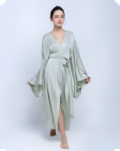 HANDMADE ITEAM - perfect French seam - The model is 5'7 tall and wearing size S. QUALITY KIMONOS: Our kimonos for women are made from Silk, comfortable and lightweight. Gentle cycle mode when you use machine wash with cold and in washing bag or hand-wash with cold water is the best, and hang flat to dry - Please do not squeeze or dry with dryer. THREE SIZE: Using only the best materials in the market, our charmeuse robe or long robe kimono for women have three size are small size, medium size and large size , fits most women as a dressing gown. DESIGN: Long style kimono robe for women, kimono sleeves, ankle length, tie waist and inside ties. PLEASE NOTE THAT ACTUAL COLORS MAY VARY DUE TO YOUR COMPUTER RESOLUTION AND MONITOR COLOR RETRICTIONS. VERSATILITY: The design perfect for daily wear Robe For Women, Silk Kimono Robe, Silk Robe, Bridesmaid Robes, Womens Robes, Mint Color, Silk Kimono, Long Style, Kimono Sleeve